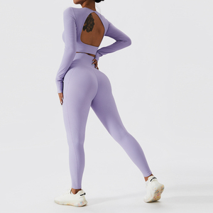 Nueva llegada de trajes de fitness de punto de cintura cruzada con logotipo personalizado para mujer conjuntos de gimnasio de color sólido-Venta caliente Leggings largos XL Active Wear - Product Image 5