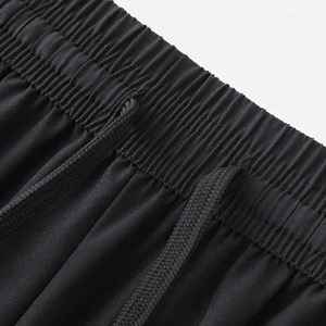 กางเกงขาสั้นผ้าฝ้ายโพลีเอสเตอร์สำหรับเล่นบาสเก็ตบอลสำหรับผู้ชายกางเกงขาสั้นสีดำเรียบติดโลโก้ตามต้องการ - Product Image 6