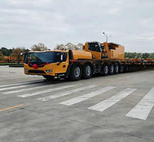 Grúa telescópica amarilla XCA1000G9-1 de servicio pesado con motor, bomba y engranajes, altura de elevación de 153 m para patios de construcción - Product Image 4