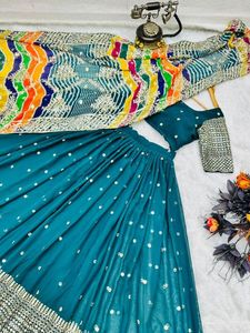 Chemisier de créateur Lehenga entièrement cousu avec broderie de travail séquentiel Design belle couleur tissu Georgette - Product Image 4