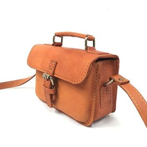 Bolso bandolera de cuero tostado clásico hecho a mano Indonesia Vintage Mini bolso de hombro con cierre de Asa superior elegante - Product Image 1