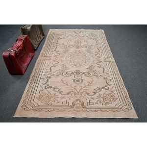 Alfombra Turca Vintage de 4.8x8.3 pies, Alfombra de Lana con Borde Marrón - Product Image 1