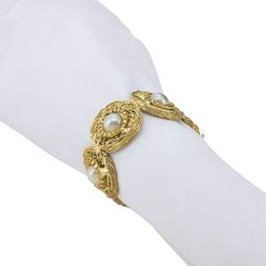 Servilletero redondo de metal hecho a mano único para la decoración de la mesa del restaurante de alta calidad con un elegante estilo atemporal - Product Image 1