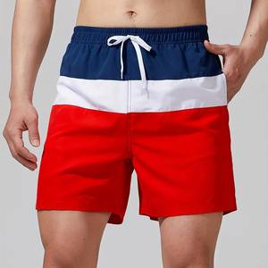 Verano de moda Color Block Streak patrón estampado hombres mujeres bañadores secado rápido cordón playa pantalones cortos 100% algodón traje de baño - Product Image 1