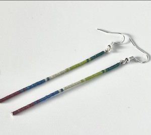 Pendientes de borla con cuentas de semillas largas de calidad de lujo - Product Image 1