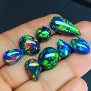 Magnifique éthiopien noir opale pierre précieuse Welo brillant arc-en-ciel Flashy opale gemmes mélange forme éthiopien noir opale Cabochon cadeau pour elle - Product Image 1