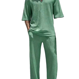 2025 Nueva Primavera Verano hombres retro casual traje cuello color sólido camisa de media manga pantalones sueltos con cordón traje de playa de dos piezas - Product Image 3