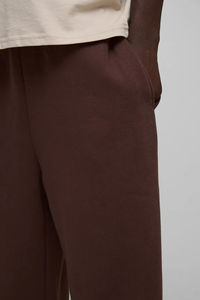 2025 recién llegado 100% algodón ajuste relajado pantalones de pierna ancha para hombre ropa casual de invierno Color sólido peso pesado personalizado lavado hombre pantalón - Product Image 3