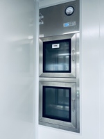 Boîte de transfert dynamique à interverrouillage mécanique pour environnements propres en usine pharmaceutique