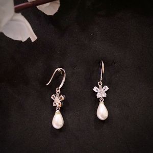 ต่างหูแบบห้อย ต่างหูมุกน้ำจืด ต่างหูรูปดอกไม้ ต่างหูมุกทรงรี ต่างหูเพชรรูปใบไม้ ต่างหูมุกยาวสำหรับงานแต่งงาน - Product Image 2