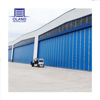 Porte de hangar d'avion électrique robuste et coupe-vent OLAND, grande taille, en acier/PC, garantie 1 an, caractéristiques de sécurité, usage industriel
