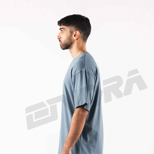 เสื้อยืดผ้าฝ้ายโอเวอร์ไซส์สำหรับผู้ชายและผู้หญิงชุดเล่นฟิตเนสแนวสตรีทแบบลำลองทรงหลวมลายพื้นของใช้ประจำวัน - Product Image 3