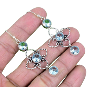 Boucles d'oreilles en topaze bleue unie faites à la main en argent Sterling 925 pour femmes Design de goutte à la mode avec fonction de balancent bijoux de Spinner de pierres précieuses - Product Image 1