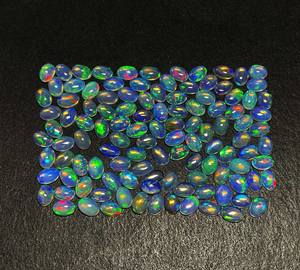 พลอยโอปอลเอทิโอเปียเพลิงสีฟ้าธรรมชาติ33ชิ้น4*6มม. ทรงวงรี10 CT ล็อต IGI อเมทิสต์อัญมณีทรงลูกแพร์อัญมณีหลวม" - Product Image 1