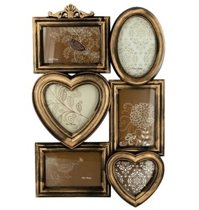 Designer metal <b>photo</b> <b>frame</b> with hand embossed detailing and smooth <b>bronze</b> finishing for upscale decor settings - Product Image 1