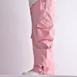 Pantalones de esquí impermeables de color rosa claro al por mayor para Uniesx con cintura ajustable y bolsillos cargo con cremallera pantalones holgados de esquí - Product Image 3