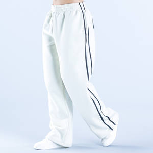 Pantalons de survêtement pour femmes de haute qualité, sur mesure, en coton blanc, à jambes larges et surdimensionnées, avec des bandes latérales - Product Image 3