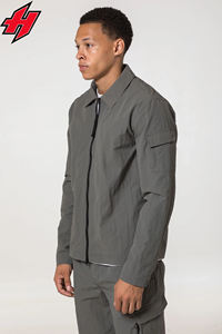 2024ขายส่งผู้ชายU NisexนักออกแบบSweatsuit Joggerเสื้อกันลมTracksuitโลโก้ที่กําหนดเองนักออกแบบไนลอนสะท้อนแสงTracksuits - Product Image 6