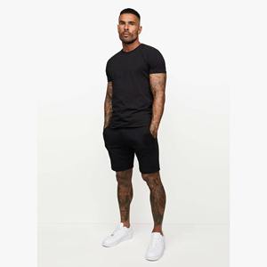 Conjunto de 2 piezas de estilo callejero de verano informal moderno para hombre, Camiseta de algodón suave con patrón sólido y pantalones cortos de punto transpirables - Product Image 1