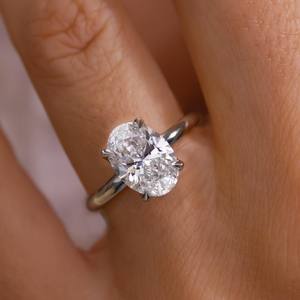 Anillo de compromiso de moissanita de corte ovalado de 10x8mm | Solitario de cuatro puntas | OEM de joyería fina de Boda nupcial de oro y plata - Product Image 4