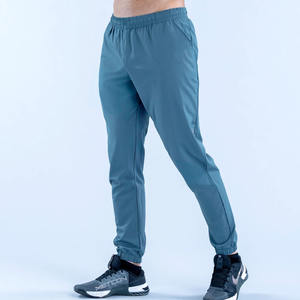 Logo personnalisé OEM Gris ardoise Unbound Joggers d'entraînement pour hommes Poches latérales Pantalon de survêtement de gymnastique Slim Fit Pantalons et pantalons pour hommes respirants - Product Image 1