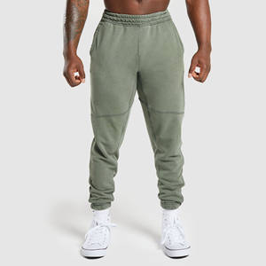 Pantalon de survêtement en molleton vintage de qualité supérieure pour homme, style streetwear, avec fermeture éclair, appliqué et broderie, effet vieilli, par le fabricant - Product Image 1