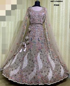 Wholesale Exquisite Pink <b>Net</b> <b>Fabric</b> Embroidered Lehenga Choli Set with Intricate Peacock Motifs Tassel Accents - Product Image 2