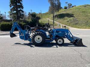 Tractor cortacésped LS de alta calidad 2024 con cargador frontal y retroexcavadora con caja de césped a la venta - Product Image 6