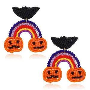 Haunting pumpkin symbols bead earrings Ethereal moonlight charm earrings Otherworldly whispers earrings Dark melody