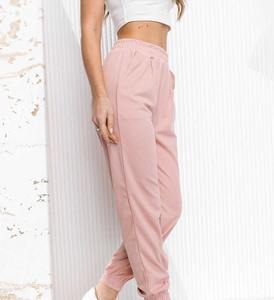 Pantalón de mujer de cintura alta de color sólido diseñado para servicios OEM ajustados ofrecidos para ropa de calle y estilo diario informal - Product Image 2