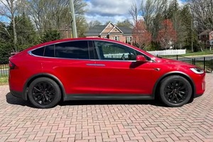 2024 Tesla Model x 75D รถ SUV ไฟฟ้าหรูที่มีขนาดกว้างขวางภายในเรียบเบาะหนังด้านซ้าย - Product Image 4