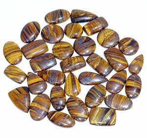 Pierre précieuse en vrac de taille d'oeil de tigre naturel brut non traitée pour la fabrication de bijoux pierres de cabochon de l'exportateur indien - Product Image 1