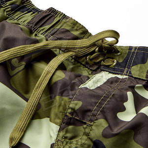 Short de plage en coton 100% avec logo personnalisé pour homme, short de course non tissé avec impression solide, short de surf - Product Image 5