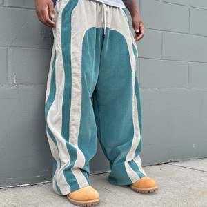 Pantalons en velours côtelé à jambes larges pour hommes, style streetwear, patchwork arqué, rayures contrastées, pantalons amples décontractés - Product Image 1