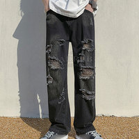 Jeans baggy à la mode avec jambe large et jean baggy en coton doux avec braguette à boutons et design classique à cinq poches
