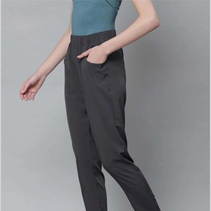 Pantalon de survêtement élégant et confortable pour femme avec taille et poches élastiques, idéal pour la course, le yoga et le fitness, respirant - Product Image 1