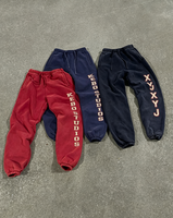 Celana Olahraga Unisex Bordir Custom Patch Model Kaki Lebar Bahan French Terry Longgar Pinggang Sedang Tersedia Layanan OEM