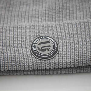 Gorro de punto bordado unisex personalizado, gorro de invierno de arrastre acrílico con borde enrollable, gorro de calavera deportivo con Parche de goma - Product Image 6