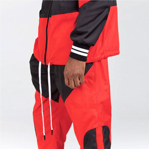 Vente en gros Ensemble de survêtement coupe-vent avec logo personnalisé Veste et pantalon résistants à l'eau Tissu respirant pour voyage sportif - Product Image 5