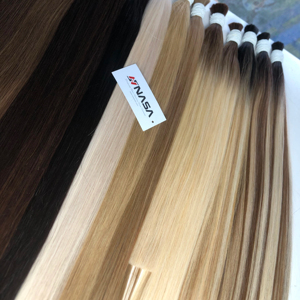 Precio de fábrica 100g Extensiones de cabello crudo ruso a granel 55 cm Cabello humano crudo vietnamita teñido en todos los colores - Product Image 1