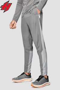 Pantalones de chándal cortavientos de nailon personalizados para hombre al por mayor Jogger de cintura alta con bolsillo de color sólido decoración bordada diseño OEM - Product Image 2