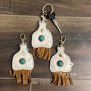 Nuevo estilo occidental Hair On Hide Leather Turquoise Fringe Key Fobs Venta caliente Cuero genuino Forma única Llaveros de lujo - Product Image 1