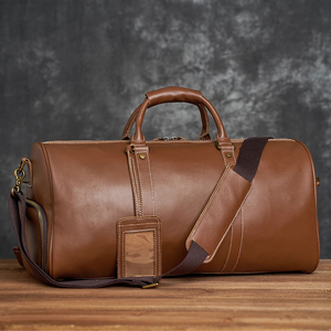 Sac de voyage en cuir véritable marron avec fermeture à glissière et sangle réglable pour les voyages - Product Image 1