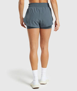 Short bleu 2 en 1 pour femmes qui évacue la sueur Short de course léger pour femmes Short de course réglable pour femmes Entrejambe 4" - Product Image 5