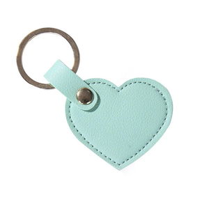 Pequeños accesorios de cuero Llavero en forma de corazón Llavero de lujo en forma de corazón de cuero PU para uso hecho a mano - Product Image 5