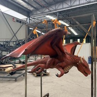 Grande statue de dragon rouge en terre cuite grandeur nature avec écailles détaillées et structure métallique pour décorations de festivals, centres commerciaux et aéroports