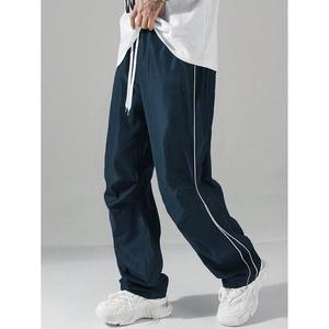 Pantalons de haute qualité avec passepoil Pantalons de survêtement en nylon personnalisés Pantalons de survêtement baggy en nylon à rayures pour hommes - Product Image 2