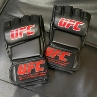 Gants de combat professionnels de haute qualité pour compétition UFC MMA, en cuir, demi-doigts, paume ouverte, pour entraînement de kickboxing, noirs