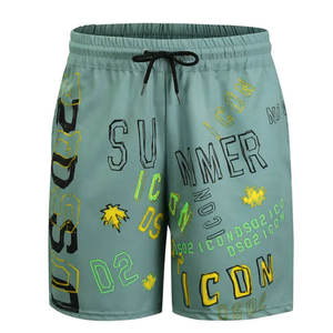 Vêtements de plage de luxe personnalisés à prix de gros Short de plage de couleur unie Short de bain pour hommes - Product Image 1