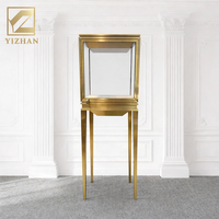 Vitrine à bijoux verticale avec éclairage LED, vitrine en verre hautement transparent, cadre en titane doré, design cubique, écologique